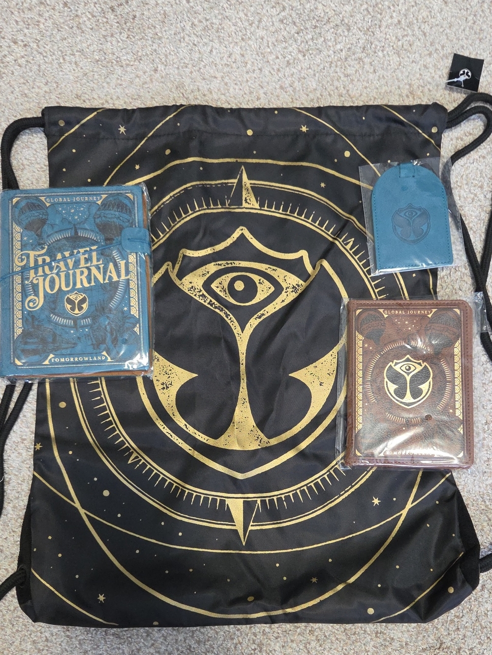 Tomorrowland Black Drawstring Backpack with Gold Emblem